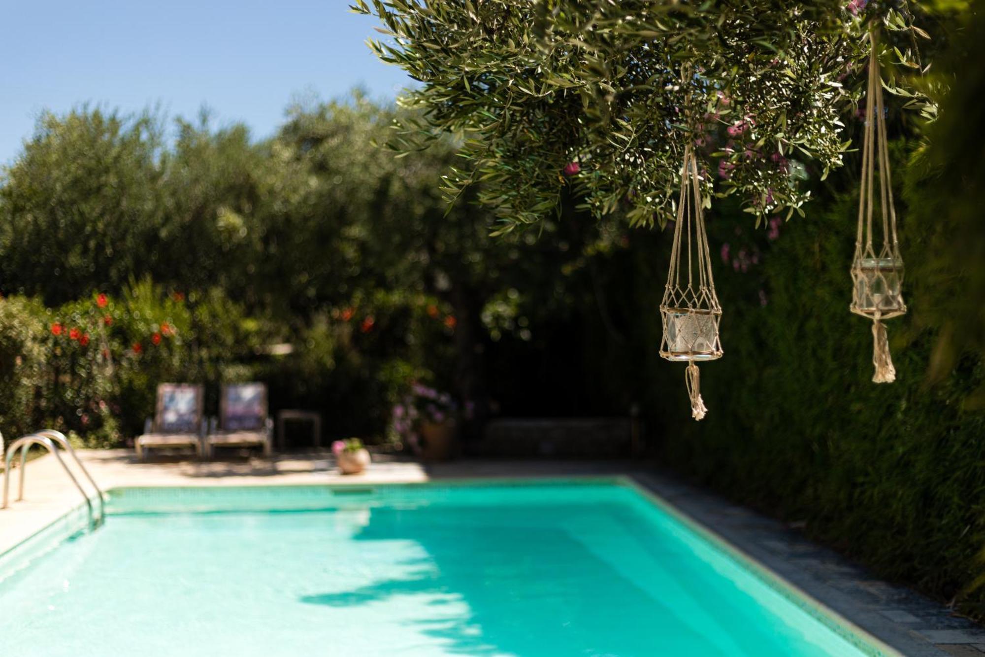 Tria Luxury Residences Stoupa Bagian luar foto